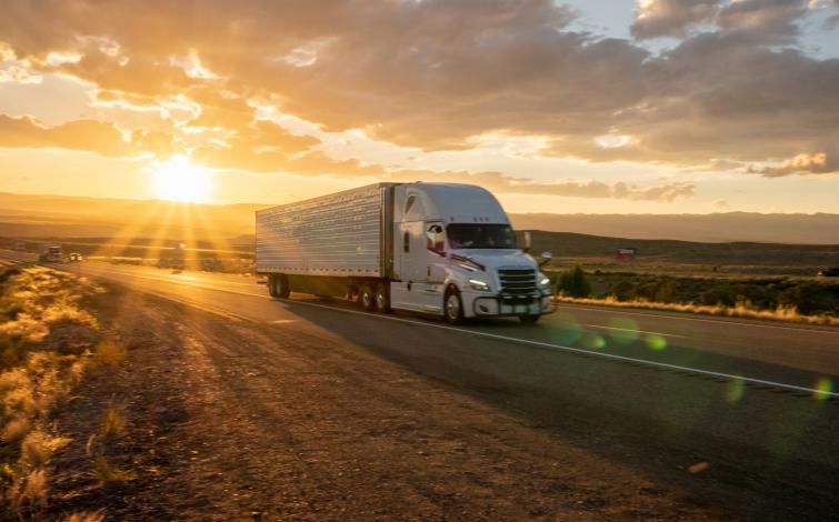 Truck on Highway at Sunrise